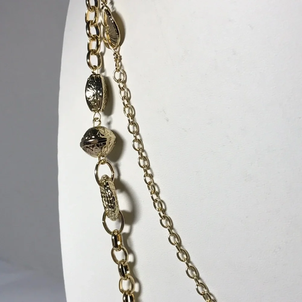 Shiny gold tone necklace/ double strands in very good pre-owned condition